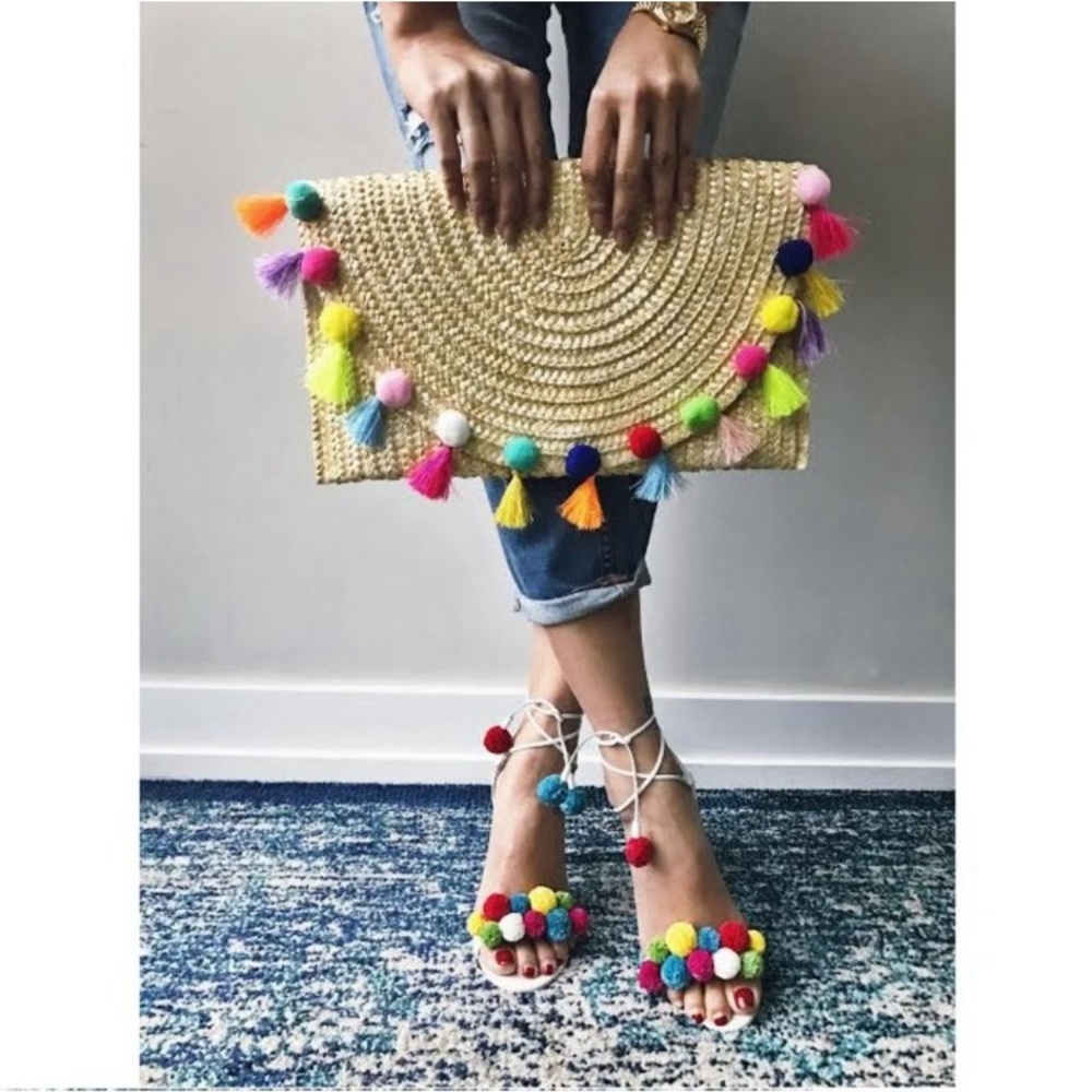 STRAW POM POM FRINGED CLUTCH